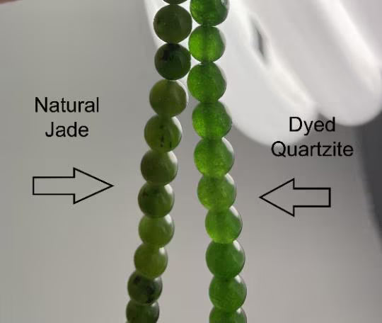 Two strands of 16mm green nephrite jade beads; natural jade on the left and dyed quartzite on the right.
