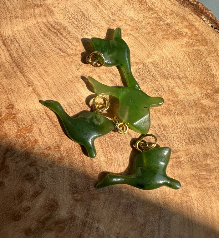 Green jade goose charms connected by gold loops