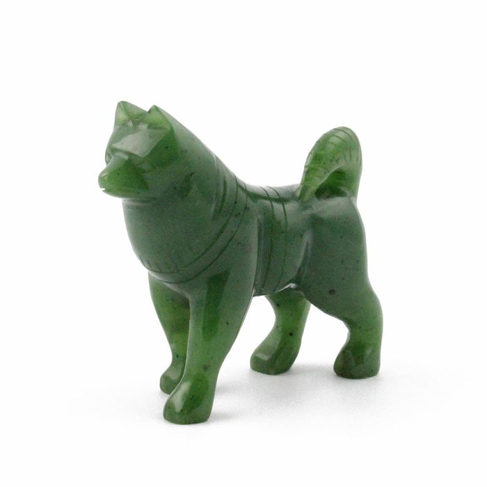 Green stone husky figurine standing on four legs.
