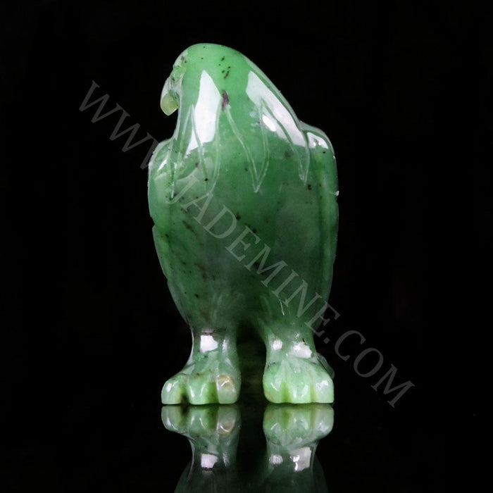 Green jade standing eagle from the back highlighting feather texture