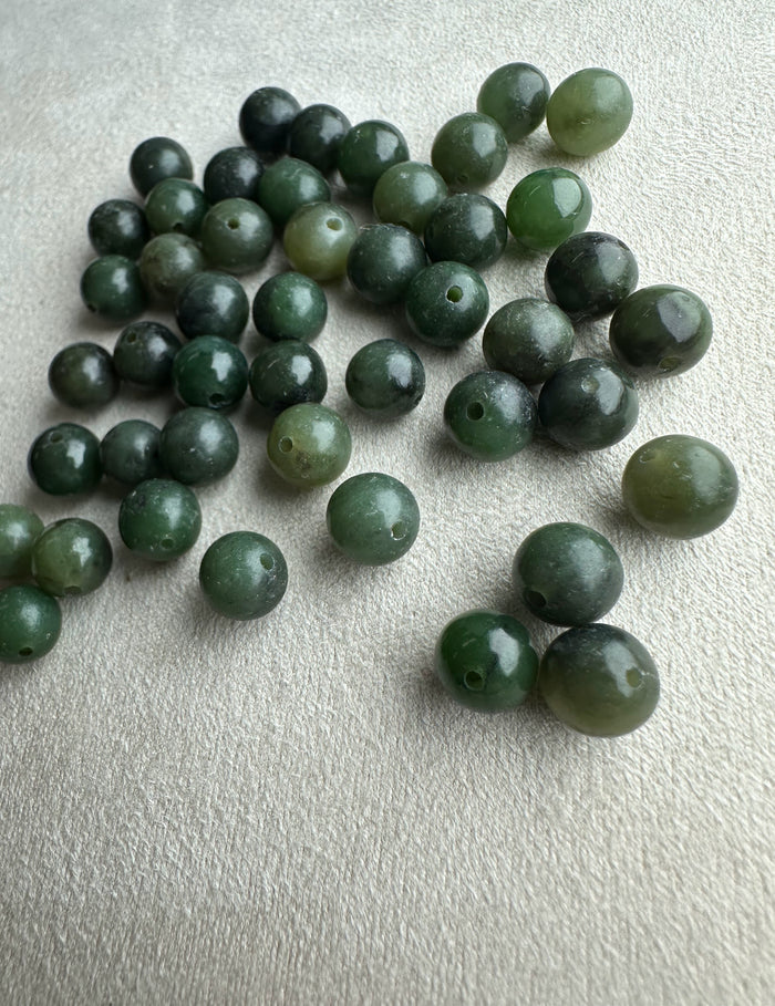 Natural Canadian nephrite jade beads 7-8.5mm with drilled holes in varying green shades