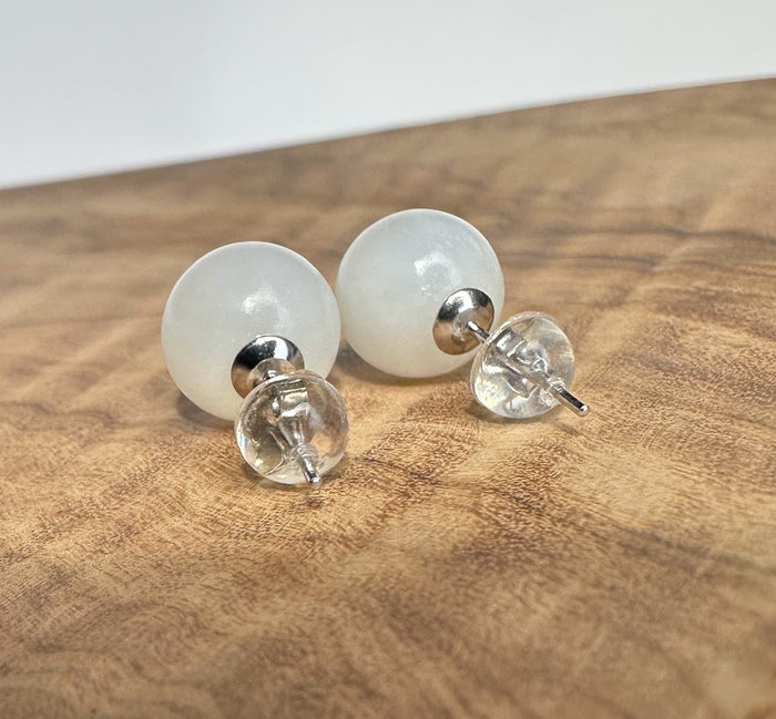 back side of white jade stud earrings