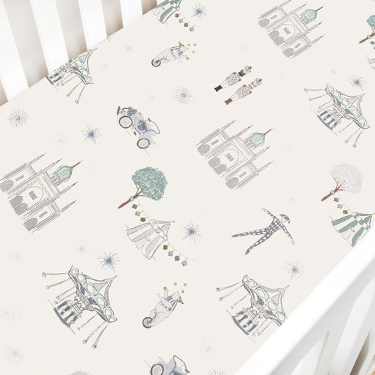 Crib sheet with vintage car and house pattern on a white background