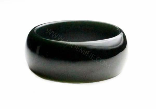 Polished black jade ring with a thick rounded exterior