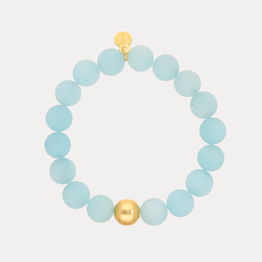 a blue beaded bracelet with a gold bead