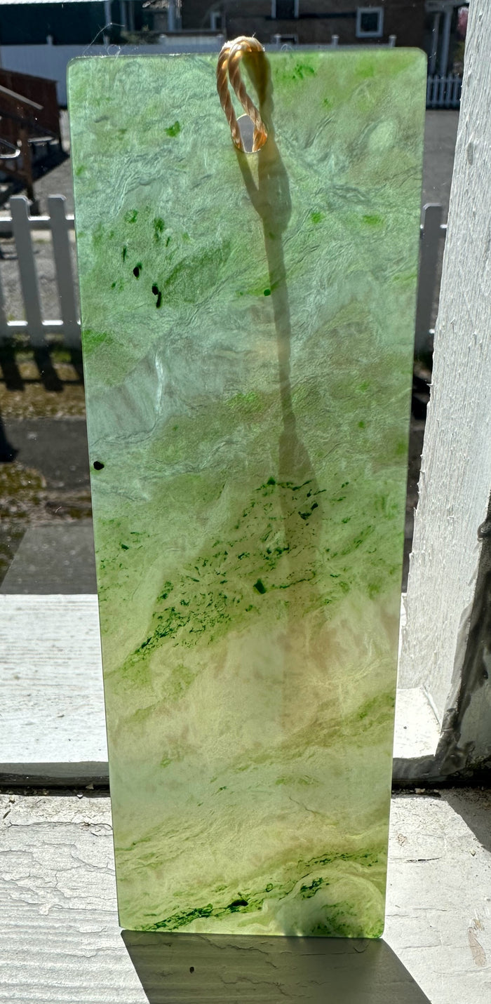 Canadian Jade Bookmark 6 inches with copper loop photographed outdoors