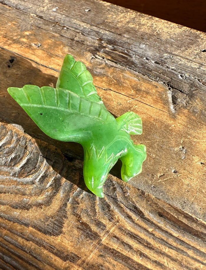 Back view of jade eagle brooch showing the silver pin backing