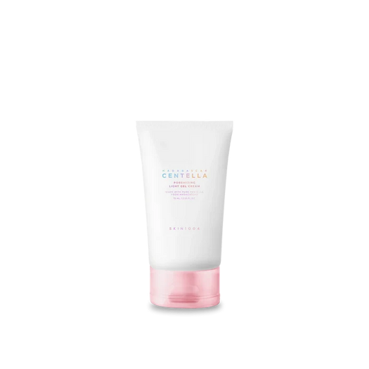 Skincare product with white container and pink base on a white background
