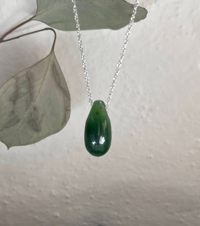 Dark green Canadian Jade 20mm teardrop pendant on a silver chain.
