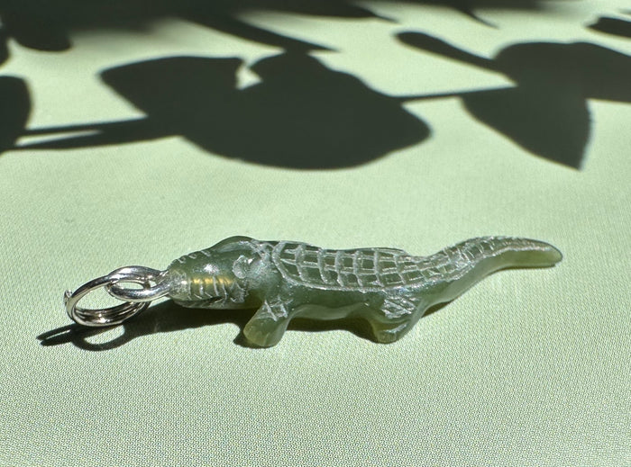 Dark green jade alligator charm with metal attachment loop