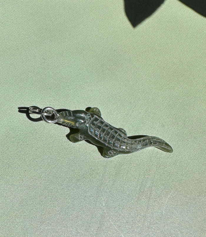Dark green jade alligator charm with a metal loop for pendant