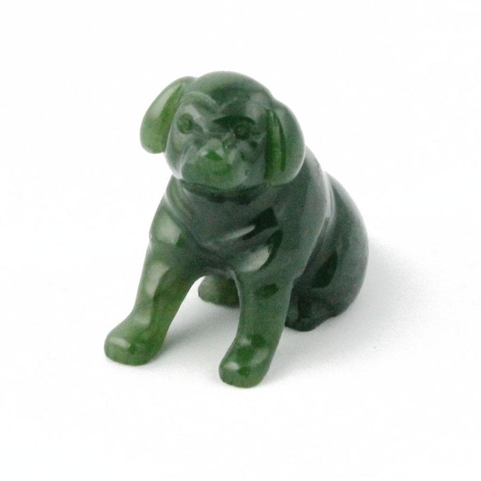 Glossy green Labrador retriever figurine sitting with a calm expression
