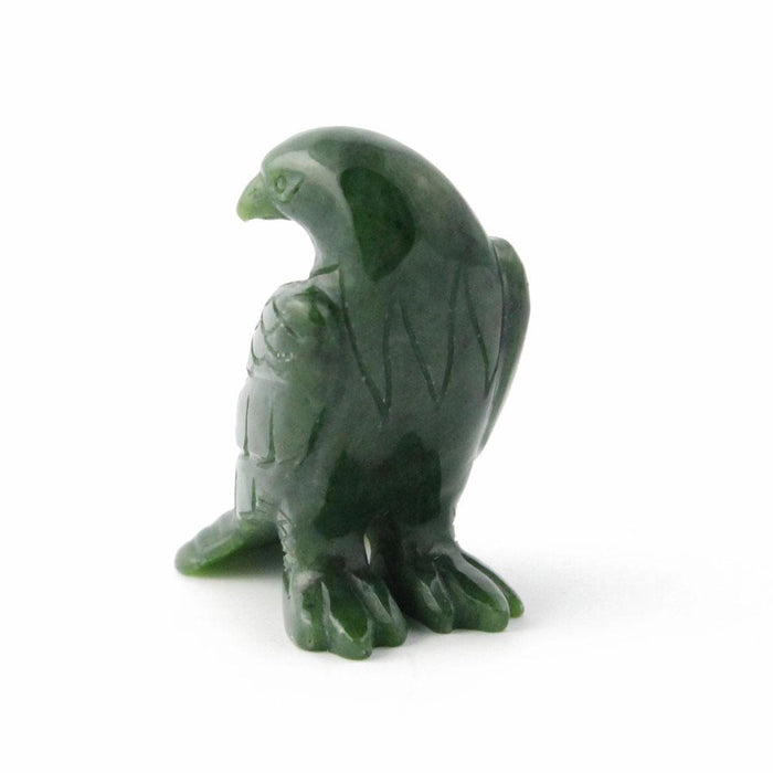 Green jade eagle figurine angled view showing carved feather pattern on wings