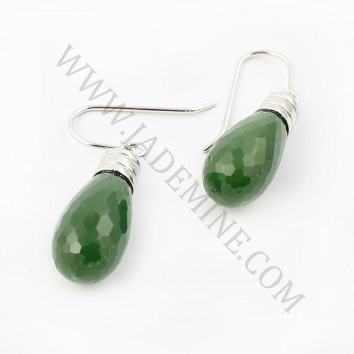Pair of green teardrop faceted gemstone earrings with silver caps and ear wires