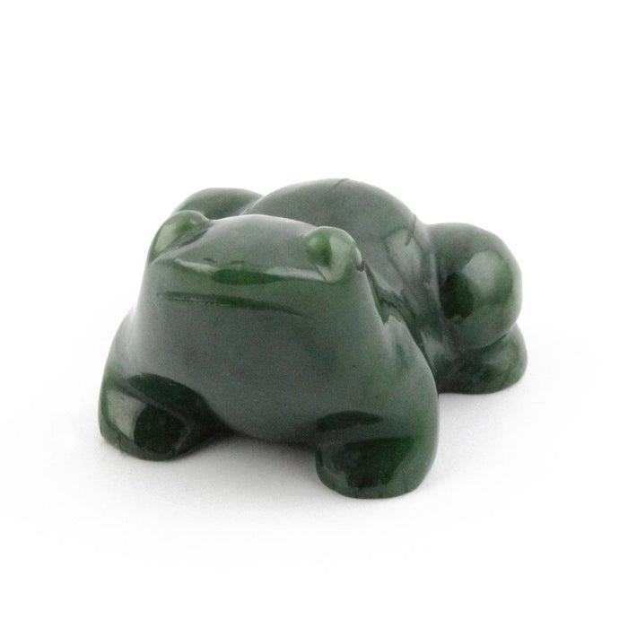 Back view of two glossy dark green frog figurines