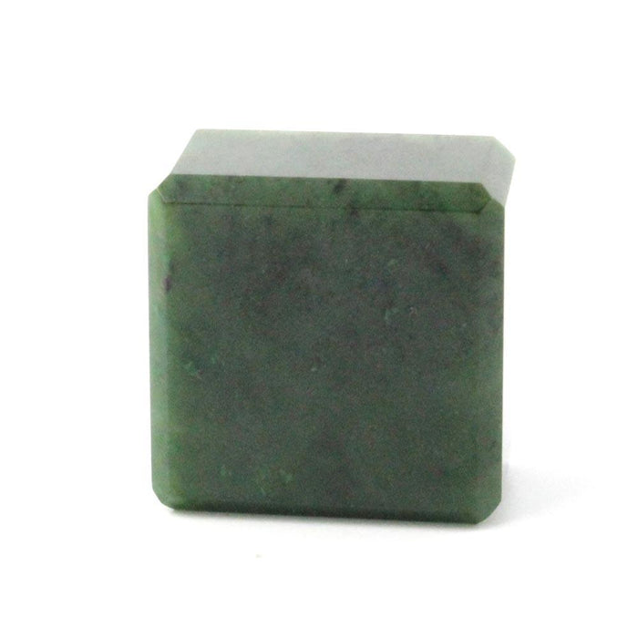 Dark green mineral sample with a flat base and a bright angled top facet.