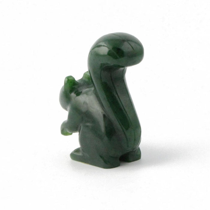 Dark green 1.5 inch squirrel figurine standing upright with a curved tail