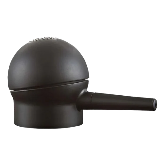 Svart Toppik hårfiber-applikator med ergonomisk design og hull for presis påføring