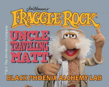 Fraggle Rock character with text about 'Uncle Traveling Matt' and 'Black Phoenix Alchemy Lab'.
